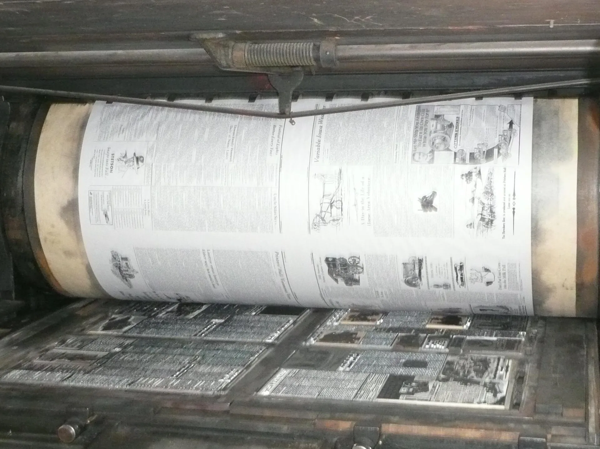 The bed of metal type and print roller of a Miehle Model 00 flat-bed cylinder printing press in operation. This press, now at the printer's hall of the Old Thresher's Reunion museum, was originally sold to the US Bureau of Engraving and Printing , which sold it to The Yellow Springs (Ohio) News in 1. Start a print shop in order: one proof before each spend